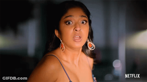 A Woman With A Surprised Look On Her Face And A Netflix Logo Behind Her GIF