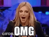 A Woman With A Surprised Look On Her Face And The Word Omg Written On Her Face . GIF