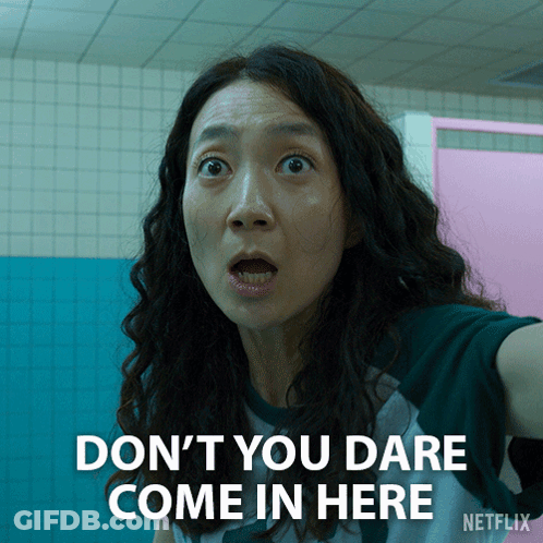 A Woman With A Surprised Look On Her Face And The Words " Don T You Dare Come In Here " GIF