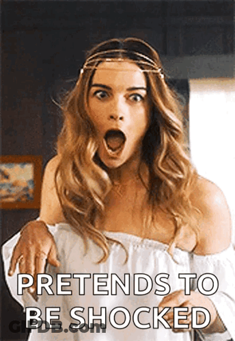 A Woman With A Surprised Look On Her Face And The Words `` Pretends To Be Shocked '' . GIF