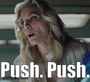 A Woman With A Surprised Look On Her Face And The Words Push Push Written Below Her GIF