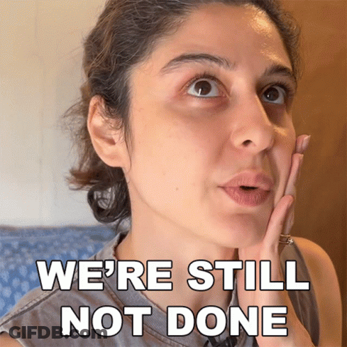A Woman With A Surprised Look On Her Face And The Words We 'Re Still Not Done Behind Her GIF