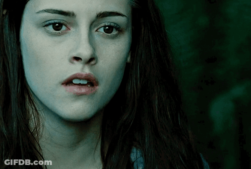 A Woman With A Surprised Look On Her Face GIF