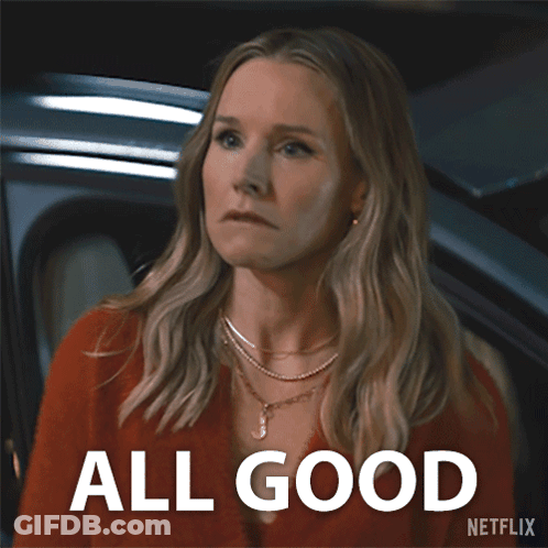 A Woman With A Surprised Look On Her Face Is Next To A Sign That Says " All Good " GIF