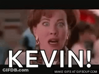 A Woman With A Surprised Look On Her Face Is Screaming The Word Kevin . GIF