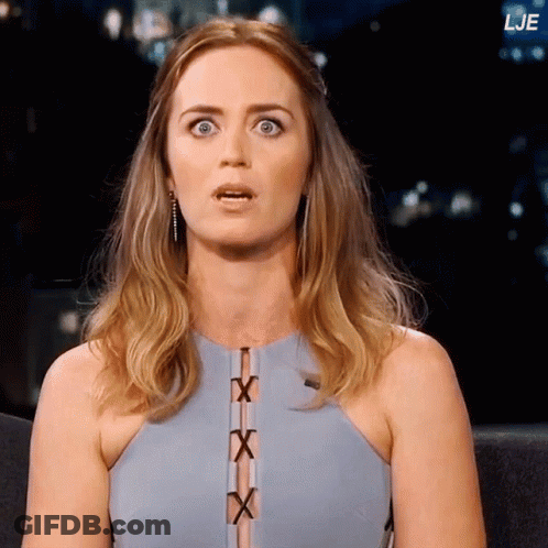 A Woman With A Surprised Look On Her Face Is Sitting In Front Of A Screen That Says Lje On It GIF