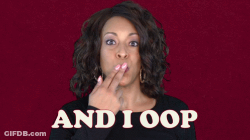 A Woman With A Surprised Look On Her Face Is Standing In Front Of A Sign That Says " And I Oop " GIF