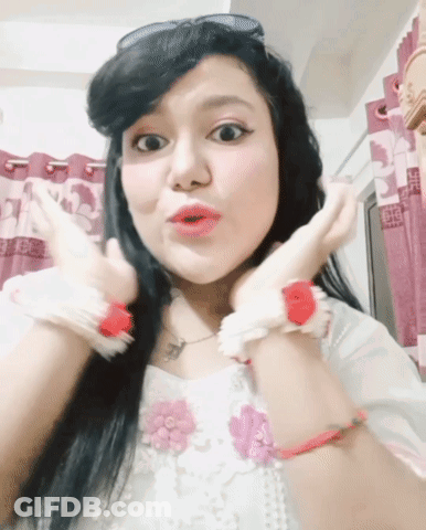 A Woman With A Surprised Look On Her Face Is Wearing Sunglasses GIF