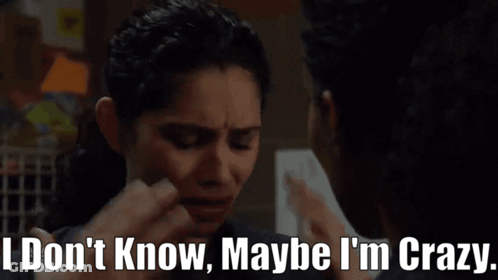A Woman With A Surprised Look On Her Face Says I Don 'T Know Maybe I 'M Crazy GIF