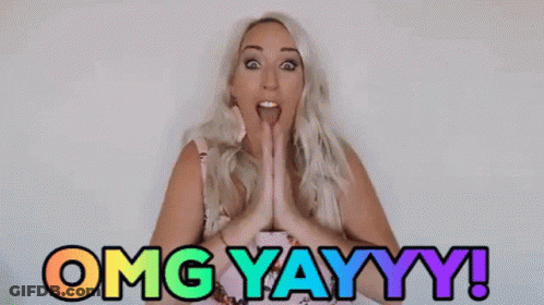 A Woman With A Surprised Look On Her Face Says Omg Yayyy ! GIF