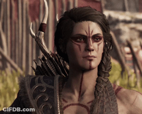 A Woman With A Tattoo On Her Face Is Holding An Arrow GIF