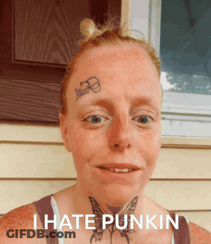 A Woman With A Tattoo On Her Forehead And The Words I Hate Punkin On The Bottom GIF