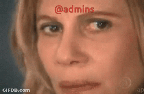 A Woman With A Triangle On Her Face And The Words @Admins Above Her GIF
