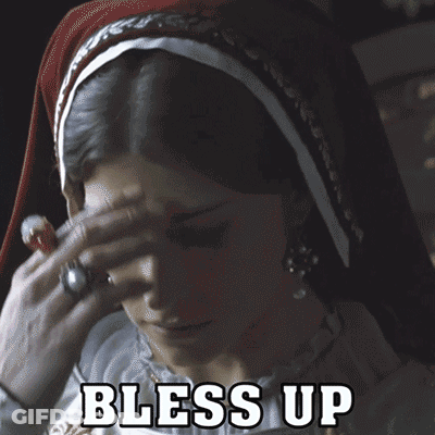 A Woman With A Veil On Her Head And The Words Bless Up Written Above Her GIF