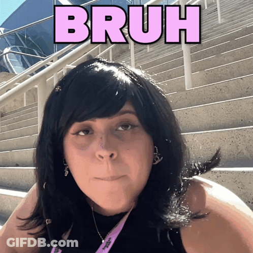 A Woman With A Wig And A Lanyard That Says Bruh On It GIF