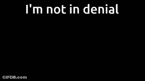A Woman With An Angry Look On Her Face And The Words I 'M Not In Denial GIF