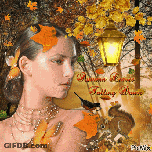 A Woman With Autumn Leaves Falling Down On Her Face GIF