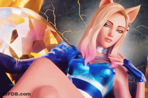 A Woman With Blonde Hair And Blue Eyes Is Wearing A Blue Outfit GIF