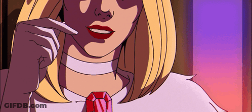 A Woman With Blonde Hair And Red Lips Is Wearing A Choker And A Red Necklace GIF