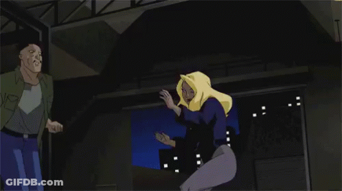 A Woman With Blonde Hair Is Being Held By A Man GIF