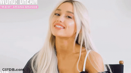 A Woman With Blonde Hair Is Sitting In A Chair With The Words World Dream Sneak Peek Above Her GIF