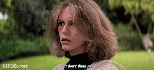 A Woman With Blonde Hair Is Standing In A Park And Says `` I Don 'T Think So '' . GIF