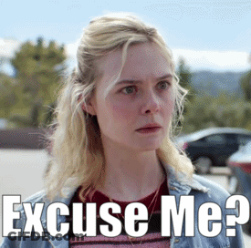 A Woman With Blonde Hair Is Wearing A Denim Jacket And A Red Shirt And Says Excuse Me ? GIF