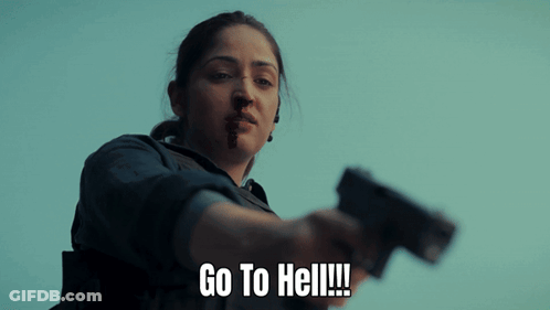 A Woman With Blood On Her Face Is Holding A Gun And Says Go To Hell !!! GIF