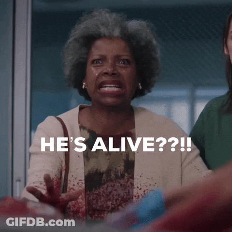A Woman With Blood On Her Hands Says He 'S Alive In White Letters GIF