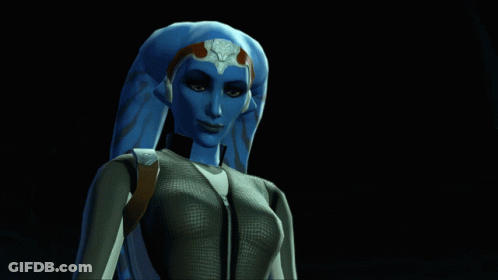 A Woman With Blue Hair And A Crown On Her Head Looks At The Camera GIF