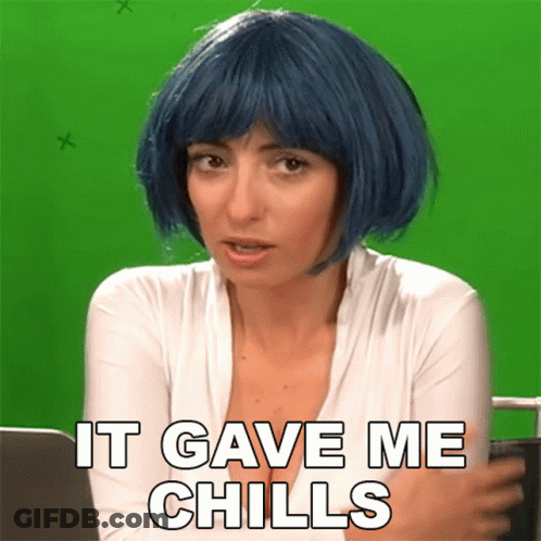 A Woman With Blue Hair Has The Words It Gave Me Chills Above Her GIF