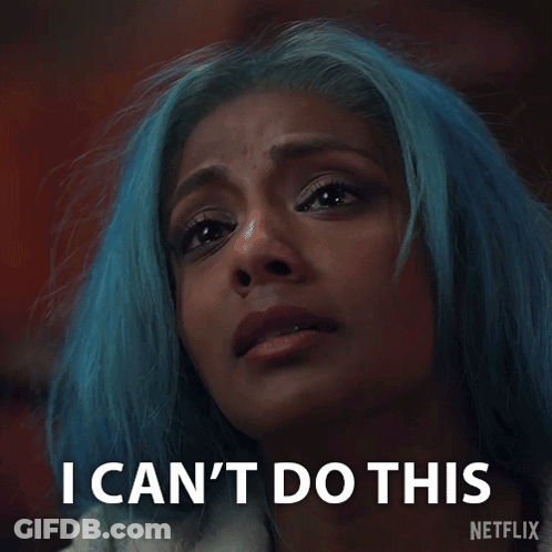 A Woman With Blue Hair Is Crying With The Words " Without You " Behind Her GIF