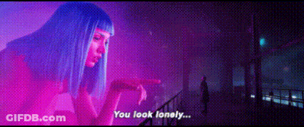 A Woman With Blue Hair Is Pointing At A Balcony And Says `` You Look Lonely ... '' GIF