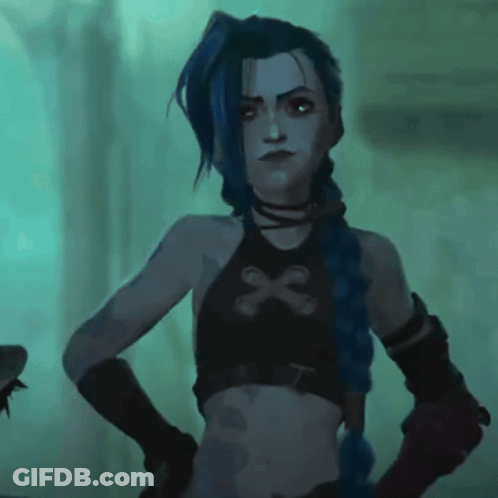 A Woman With Blue Hair Is Wearing A Black Crop Top With A Skull On It . GIF