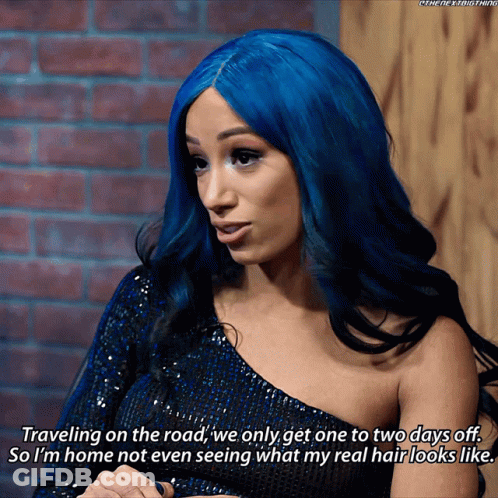 A Woman With Blue Hair Says Travelling On The Road We Only Get One To Two Days Off GIF