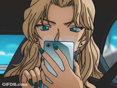 A Woman With Blue Nails Is Holding A Cell Phone In Her Hand GIF