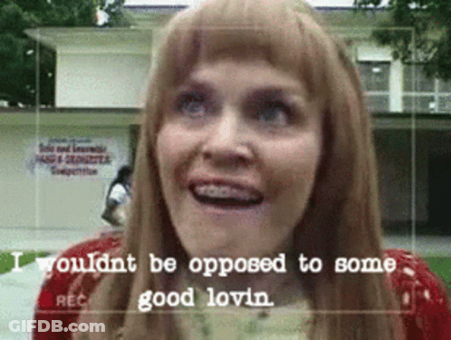 A Woman With Braces On Her Teeth Is Smiling With The Words " Wouldnt Be Opposed To Some Good Lovin " On The Bottom GIF