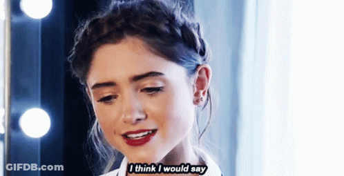 A Woman With Braided Hair And Red Lipstick Says I Think I Would Say . GIF