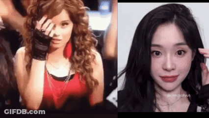 A Woman With Curly Hair And A Woman With Long Black Hair . GIF