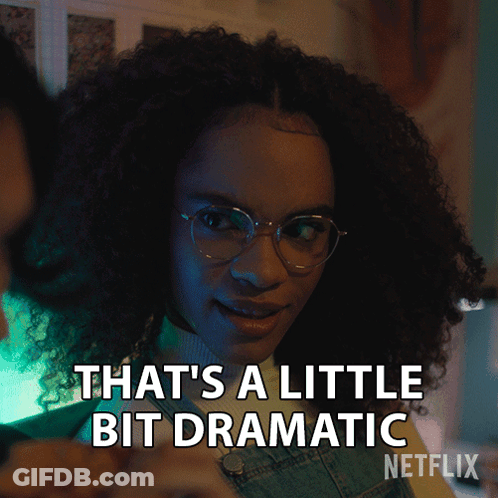A Woman With Curly Hair And Glasses Says " That 'S A Little Bit Dramatic " GIF
