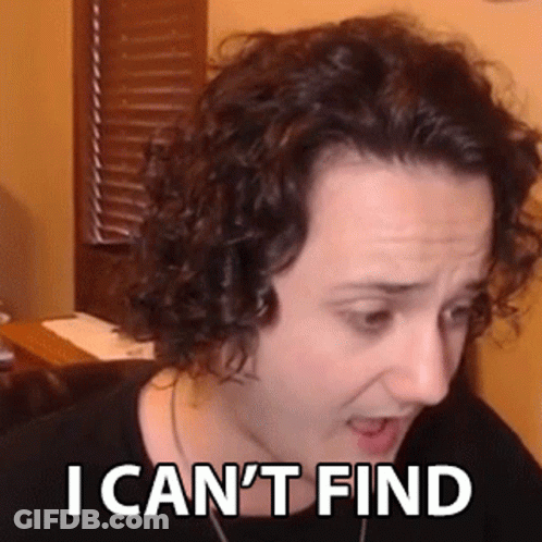 A Woman With Curly Hair Is Making A Funny Face With The Words `` I Can 'T Find '' Written On Her Face . GIF
