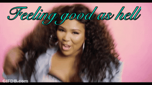 A Woman With Curly Hair Is On A Pink Background With The Words Feeling Good As Hell Above Her GIF