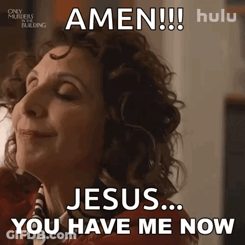 A Woman With Curly Hair Is Saying Amen Jesus You Have Me Now . GIF