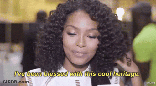 A Woman With Curly Hair Is Saying I 'Ve Been Blessed With This Cool Heritage . GIF