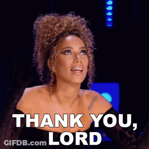 A Woman With Curly Hair Is Saying " Thank You " GIF