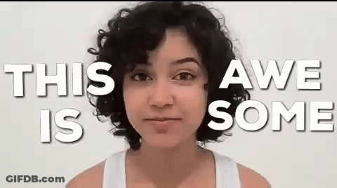 A Woman With Curly Hair Is Standing In Front Of A White Background With The Words `` This Awe Is Some '' . GIF