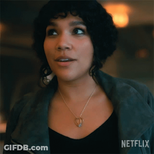 A Woman With Curly Hair Says No Thanks In A Netflix Ad GIF