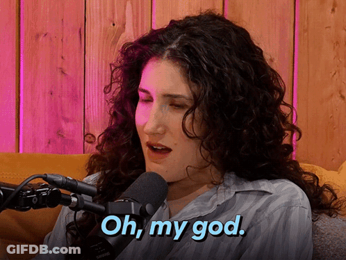 A Woman With Curly Hair Says Oh My God GIF