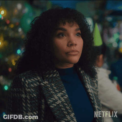 A Woman With Curly Hair Says " Thought I 'D Pop In And Say Hello " GIF
