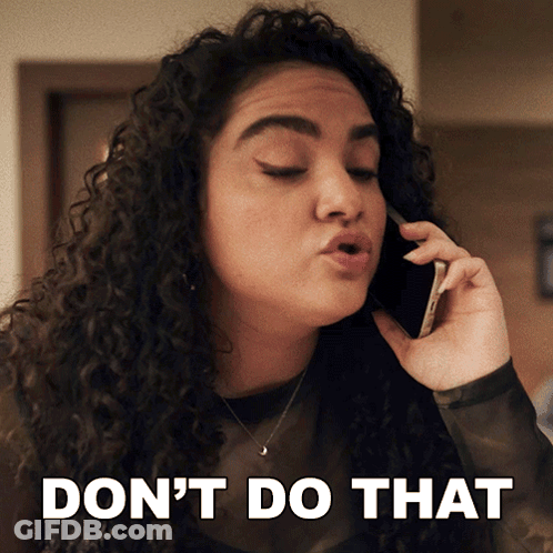 A Woman With Curly Hair Talking On A Cell Phone With The Words " Don 'T Do That " Above Her GIF